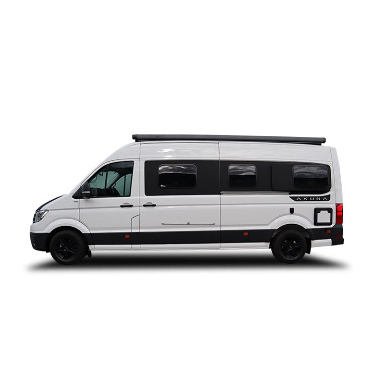 White passenger van with roof rack on a clean white background