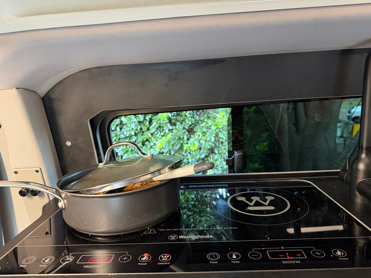 Induction cooktop in the Trakkadu kitchen