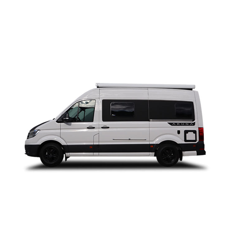 White panel van with high roof and black trim on a white background